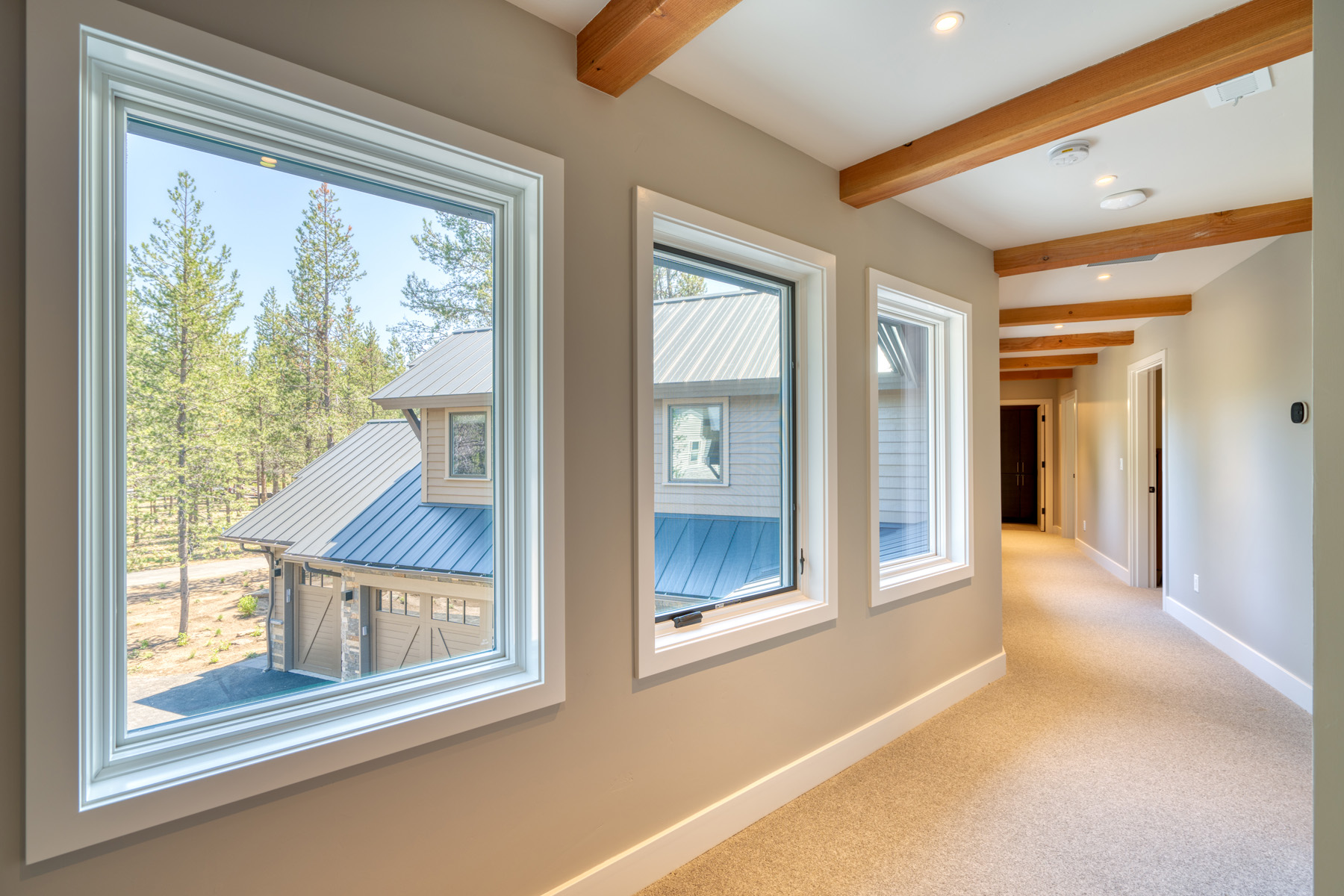 Upper hallway with exposed beams